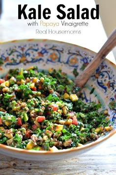 a close up of a bowl of food with broccoli and other foods in it