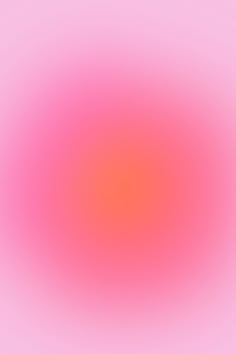 an orange and pink colored blurry background