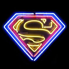 a neon superman sign with the letter s in it's center is lit up