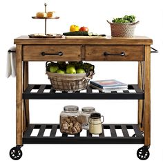 a wooden table with two baskets on it and some fruit in the basket next to it