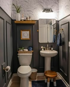 a bathroom with gray walls and white fixtures is featured in the magazine's website