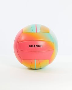 a colorful beach ball with the word chance written on it sitting in front of a white background