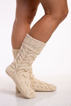 Unique designed, hand knit wool socks. Cable knit pattern, made from natural sheep wool.  Adorable white color, extremely thick and warm wool yarn. These hand knitted socks will keep you warm and cozy during the cold months.    Materials: 100% Wool Sheep wool is very special material with various valuable characteristics. It is Anti-allergic, Breathable and Antimicrobial. It naturally helps regulate body temperature and cancels out odors. It is anti-static, stain resistant and easy to clean, it Wool Sheep, Knit Wool Socks, Cable Knit Socks, Socks Womens, Hand Knit Socks, Knitted Socks, Winter Socks, Thick Socks, Wool Socks