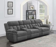 a living room with a gray couch in it