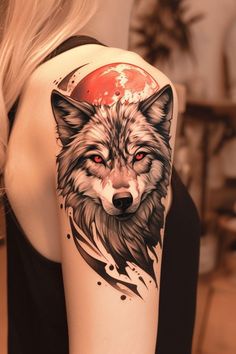 a woman with a wolf tattoo on her arm