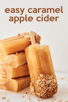 caramel apple cider popsicles stacked on top of each other with the words easy caramel apple cider