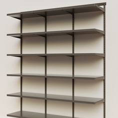 an empty book shelf with several shelves on each side and no one in the room