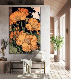 an orange flower painting hanging on the wall