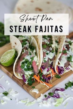 steak fajitas on a cutting board with lime wedges