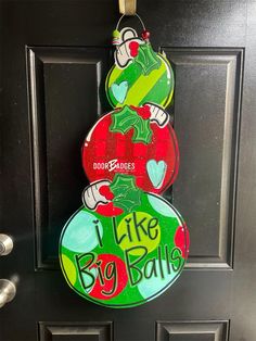 a door hanger that says i like big balls on the front and back of it