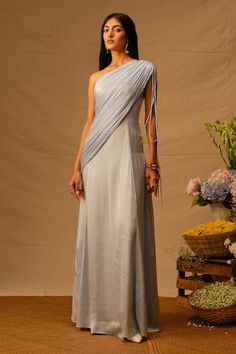 Powder blue one shoulder panelled dress with one side ruched detailing. - Aza Fashions Evening Dresses With Asymmetrical Neckline And Ruched Sides, Ruched Pre-draped Asymmetrical Dress, Pre-draped Evening Dress With Ruched Asymmetrical Neckline, Formal Blue One-shoulder Ruched Dress, Formal Blue Ruched One-shoulder Dress, Formal Blue Ruched One Shoulder Dress, Evening One Shoulder Dress With Ruched Sides, Pre-draped One Shoulder Ruched Evening Dress, Ruched One Shoulder Dress With Asymmetrical Neckline For Gala