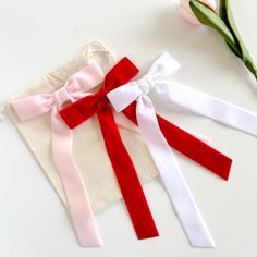 A gorgeous, classic velvet bow that is perfect for children to adults. This bow is made of high quality velvet ribbon. This bow measures 4" wide with 7" long tails. This bow can be attached to either an alligator clip with teeth or a french barrette. *There could be slight color variations due to the settings on your monitor. Thank you for shopping at Ava Bowtique! Pink Red Velvet, Newnan Ga, Bow Wedding, Easter Hair Bow, Bow Hair Clip, Wedding Bows, French Barrette, Rose Rouge, Hair Clips Girls