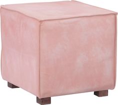 a pink square ottoman with wooden legs