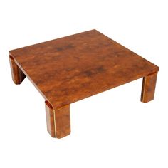 a wooden table with two legs and a square shape on the top, made out of wood