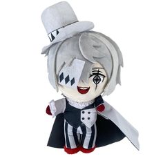 a stuffed doll with a top hat, cape and eye patch on it's face