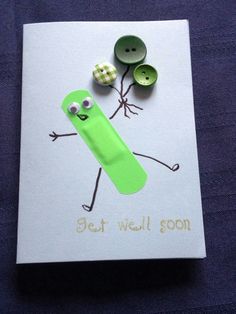 a greeting card with an image of a green pickle and two buttons on it