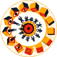 an image of a group of people standing in the middle of a circle with orange and black cubes