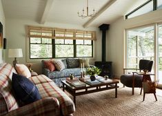 a living room filled with furniture and a fire place