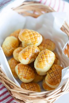 a basket filled with mini waffles sitting on top of a table