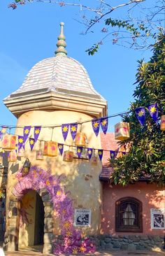 a building with flags and decorations on it