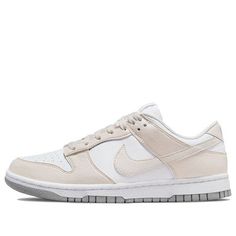 Looking for a versatile, sustainable sneaker to take your style up a notch? Check out the Nike Dunk Low Next Nature in white cream! Made with at least 20% recycled content, this low-top sneaker is perfect for those who want to minimize their environmental impact without sacrificing style. The synthetic leather upper features a pristine white base with soft beige overlays and a color-matched Swoosh, while the Volt-colored sockliner adds a pop of color. Standard Nike branding appears on the tongue tag and heel tab, while the grey rubber outsole provides durability and traction. (SNKR/Skate/Low Top/Women's/Non-Slip/Recyclable Materials) Tate Mcrae Concert, Nike Dunk Low Next Nature, Elegant Sneakers, School Basketball, Adidas Spezial, Cute Nike, Cute Nike Shoes, Cute Sneakers, Nike Brand