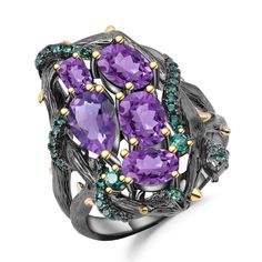 PRICES MAY VARY. This stunning black ring features a unique cutout design in 925 sterling silver, created by a talented designer. The ring is centered around five natural amethyst, each measuring 0.12" x 0.2" and 0.2" x 0.32", giving it a beautiful purple hue. Surrounding the amethysts are shimmering nano emerald green gemstones, adding a pop of color to your look. The ring has a wide face measuring 1", and is expertly crafted with S925 sterling silver and enamel coating, ensuring long-lasting c Amethyst Cocktail Ring, Vintage Jewelry Sets, Gem Ring, Laura Geller, Swiss Blue Topaz, Issey Miyake, Amethyst Gemstone, Amethyst Ring, Purple Amethyst