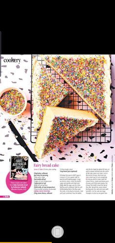 a cake with sprinkles on it sitting on a cooling rack