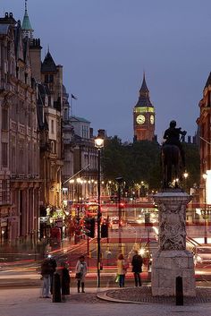 the big ben clock tower towering over the city of london, england at night time