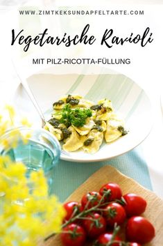 a plate of pasta with tomatoes and basil on it next to a bowl of broccoli