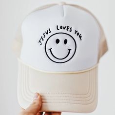 Let everyone around you know that Jesus loves them when you wear this new fav! Embroidered snapback trucker style hat 100% polyester foam front, 100% nylon mesh back Made in the USA! Colors - cream, white & black Christian Trucker Hats, Christian Outfits, Monogramming Ideas, Christian Accessories, Jesus Clothes, Christian Hats, Christian Shirts Designs, Quotes Prayer, Christian Designs