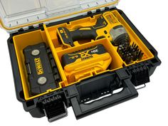 a tool box filled with tools on top of a white surface