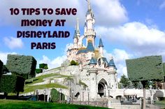 a castle with the words 10 tips to save money at disneyland paris in front of it