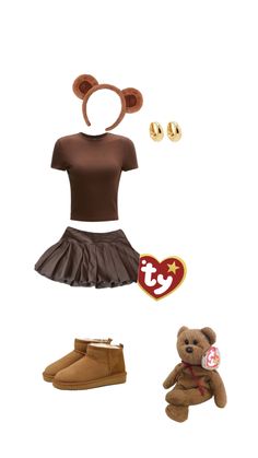 a teddy bear is wearing a brown shirt and skirt with two pairs of shoes on it