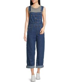 From Free People&#x2C; these overalls feature:square necklinesleevelesstapered leg5-pocket styleexaggerated pocket detailspull-on constructionapprox. 29.5" inseamcottonmachine wash/tumble dry lowImported. Casual Dark Wash Shortalls For Work, Spring Sleeveless Utility Overalls, Sleeveless Utility Overalls For Spring, High-waisted Denim Overalls With Pockets, Medium Wash Wide-leg Overalls With Pockets, Free People Denim Overalls, Medium Wash Full-length Overalls With Pockets, Blue Jean Overalls, Non-stretch Blue Denim Overalls