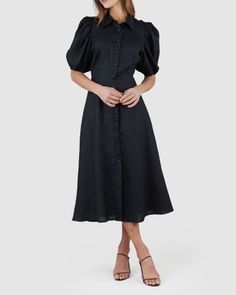 The Julius Linen Dress by Amelius showcases the best of Amelius the Label’s feminine tailoring. A sophisticated take on a button-through shirt dress, it features a neat collar, gathered puff sleeves, darting throughout the bodice and a flute Linen Dress, Fitted Bodice, Midi Length, A Line Skirts, Capsule Wardrobe, Puff Sleeve, Bodice