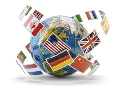 a globe with flags flying around it on a white background stock photo - 1307982