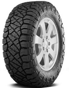 an all terrain tire on a white background