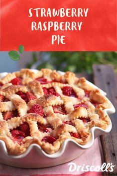 a strawberry raspberry pie on a table with the title overlaying it