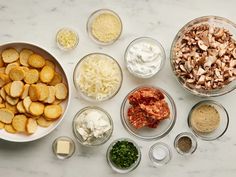 an assortment of ingredients are laid out in bowls