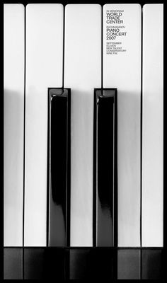 an upright piano with black and white keys