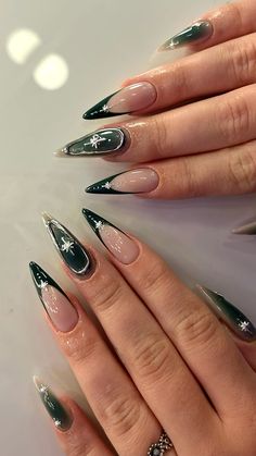 Dark green black airbrush silver stiletto french tip stars nails Nail Art Designs Dark Green, Black Silver Green Nails, Green Nail Designs Stiletto, Emerald Nails With Silver, Black Green And Silver Nails, Green And Black Almond Nails, Green Black Nail Designs, Nail Inspo Pointy, Dark Green Star Nails