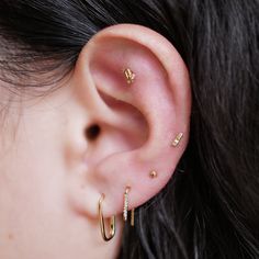 A new take on a classic hoop, the Staple Open Hoop has an asymmetrical design with a a petite diamond bar drop that adds a hint of sparkle. 14K Solid Gold Drop: 9mm Follow us on Instagram and Facebook Upper Lobe Piercing, Ear Stack, Open Hoop Earrings, Lobe Piercing, Single Rose, Helix Earrings, Diamond Bar, Gold Bar, Asymmetrical Design