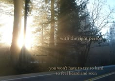 the sun shines through trees on a road with an inspirational quote written in it