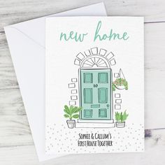 a new home card with a green door and potted houseplants on it