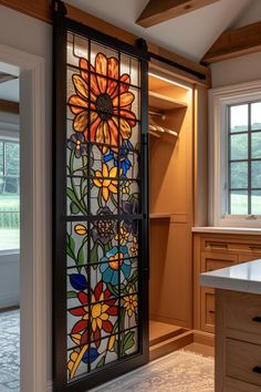 a large stained glass window in a kitchen