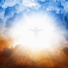 a person standing in the middle of a cloud filled sky with his arms wide open