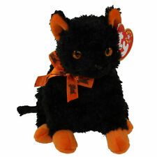 a black cat stuffed animal with an orange ribbon around it's neck and eyes