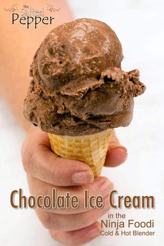 a hand holding an ice cream cone with chocolate in it and the cover of pepper magazine