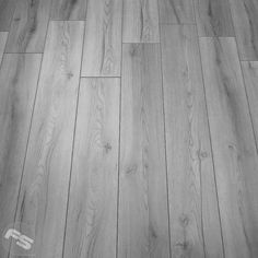 an image of wood flooring that looks like it has been painted grey and white