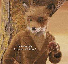 a fox dressed in a suit standing next to a tree with the caption he's sooo me scared of failure